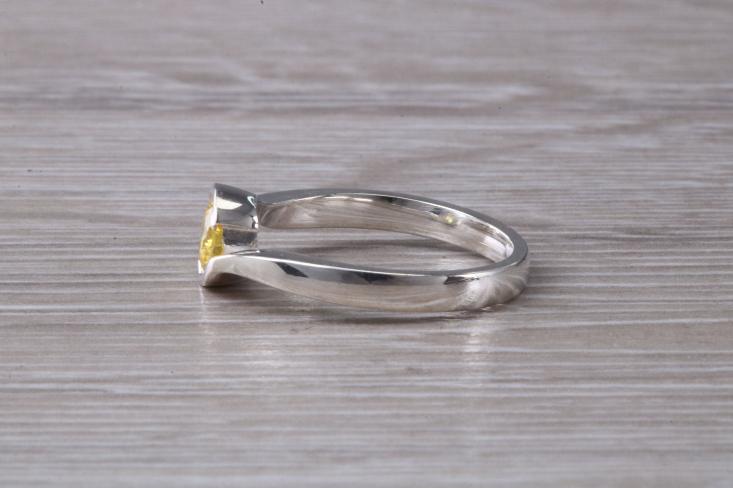 Simple and very elegant real Yellow Sapphire look ring, sterling silver set with half carat Sapphire C Z, very smooth rub over setting