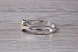 Simple and very elegant real Yellow Sapphire look ring, sterling silver set with half carat Sapphire C Z, very smooth rub over setting