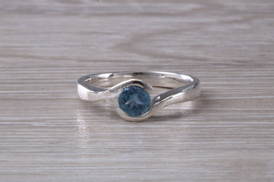 Simple and very elegant real Aquamarine look ring, sterling silver set with half carat Aquamarine C Z, very smooth rub over setting