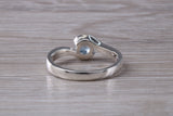 Simple and very elegant real Aquamarine look ring, sterling silver set with half carat Aquamarine C Z, very smooth rub over setting