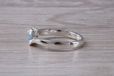 Simple and very elegant real Aquamarine look ring, sterling silver set with half carat Aquamarine C Z, very smooth rub over setting