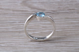 Simple and very elegant real Aquamarine look ring, sterling silver set with half carat Aquamarine C Z, very smooth rub over setting