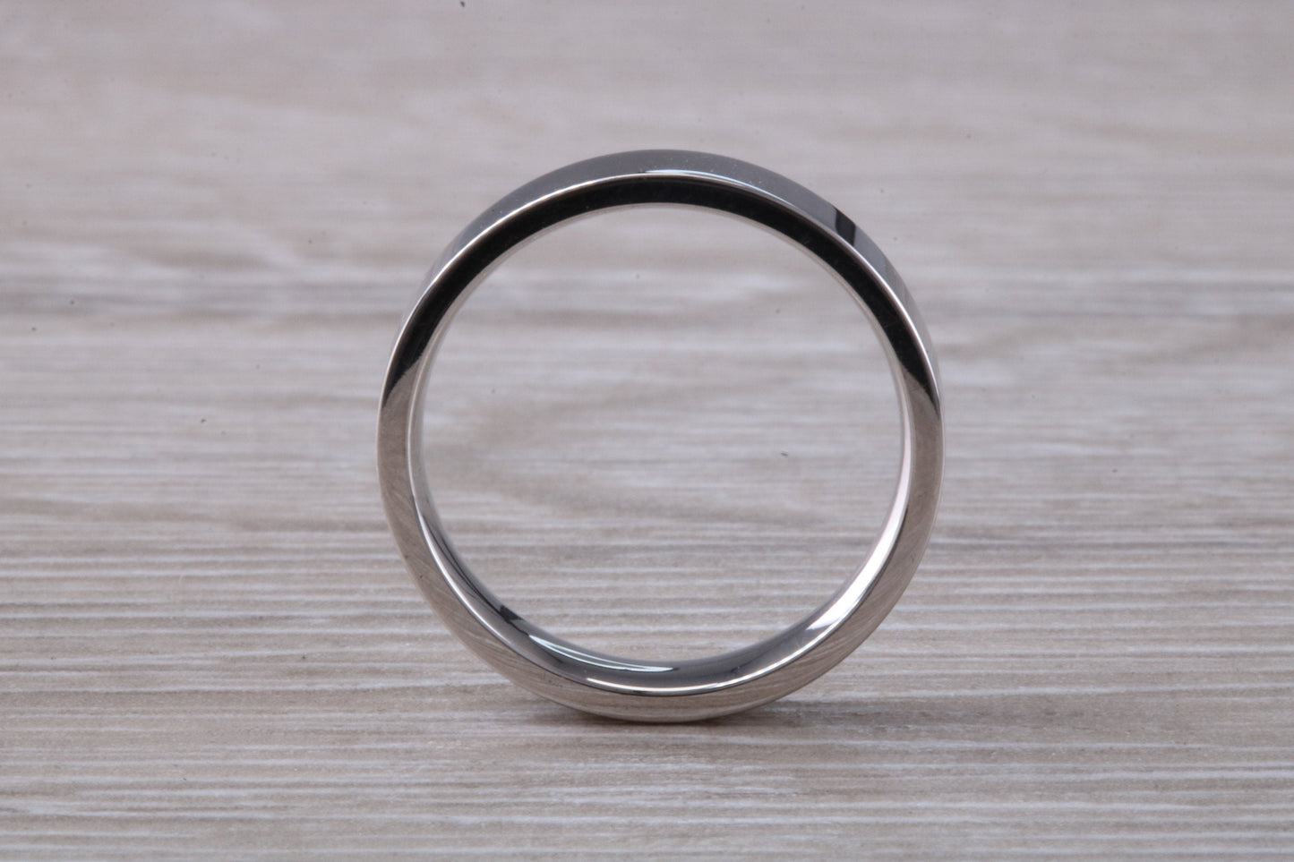 4 mm Wide Flat Comfort Fit Profile Wedding Band, made from solid 9ct White Gold