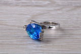 Elegant real Blue Sapphire look ring, sterling silver set with Oval cut Sapphire C Z, very unusual design