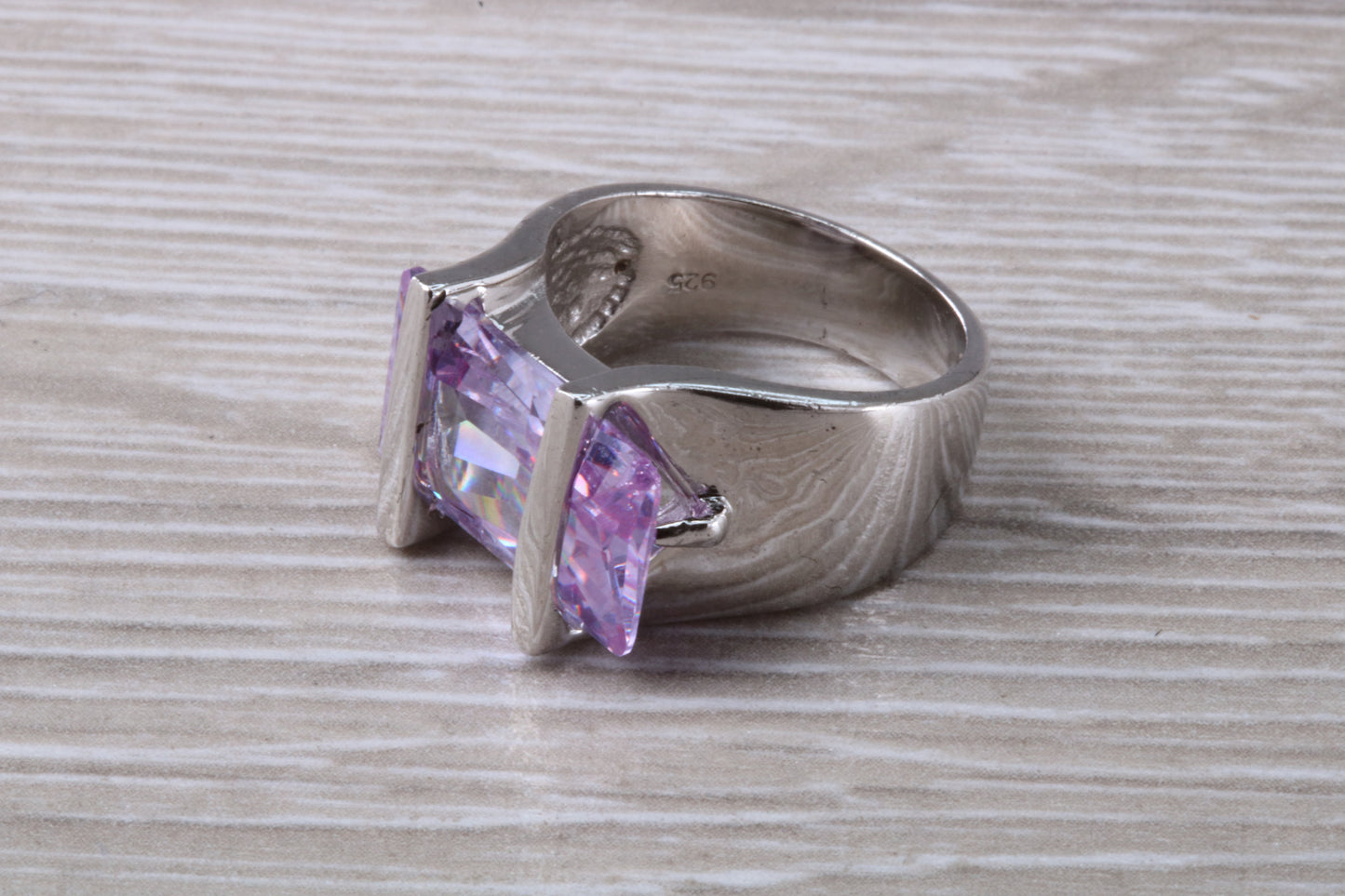 Elegant real Amethyst look ring, sterling silver set with rectangle cut Amethyst C Z, very unusual design