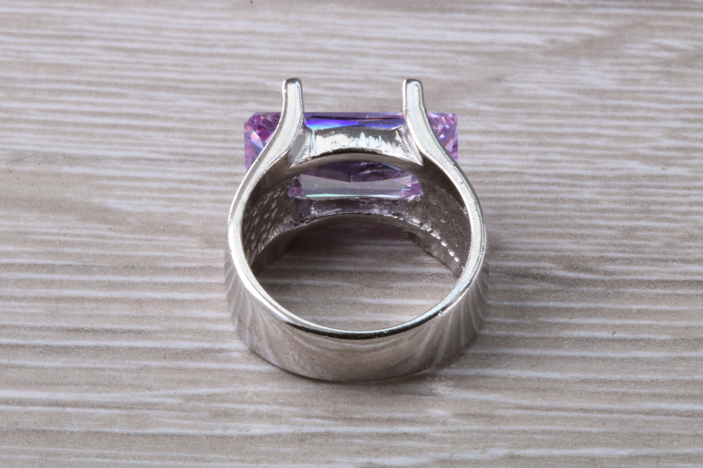 Elegant real Amethyst look ring, sterling silver set with rectangle cut Amethyst C Z, very unusual design