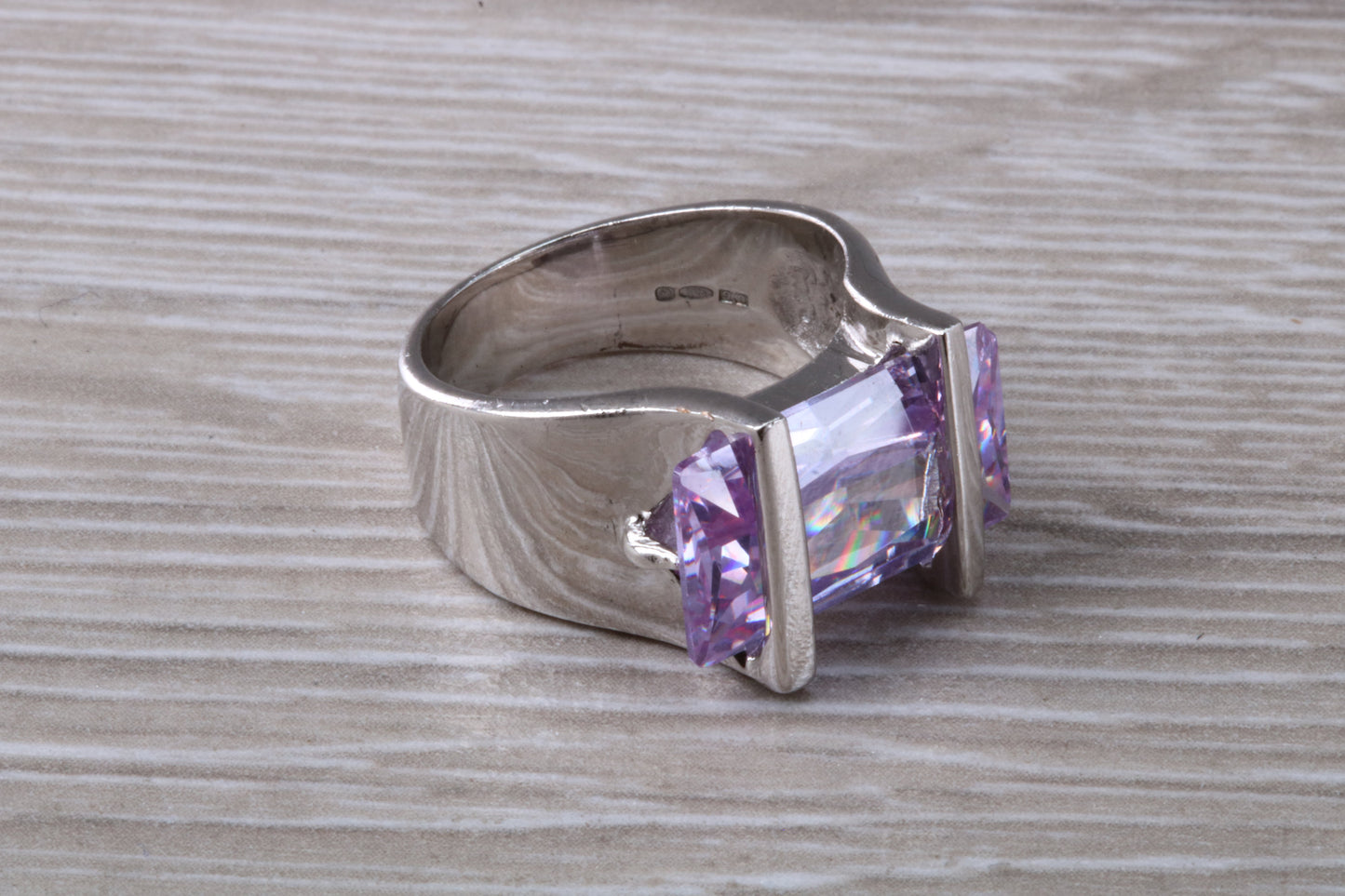 Elegant real Amethyst look ring, sterling silver set with rectangle cut Amethyst C Z, very unusual design