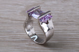 Elegant real Amethyst look ring, sterling silver set with rectangle cut Amethyst C Z, very unusual design