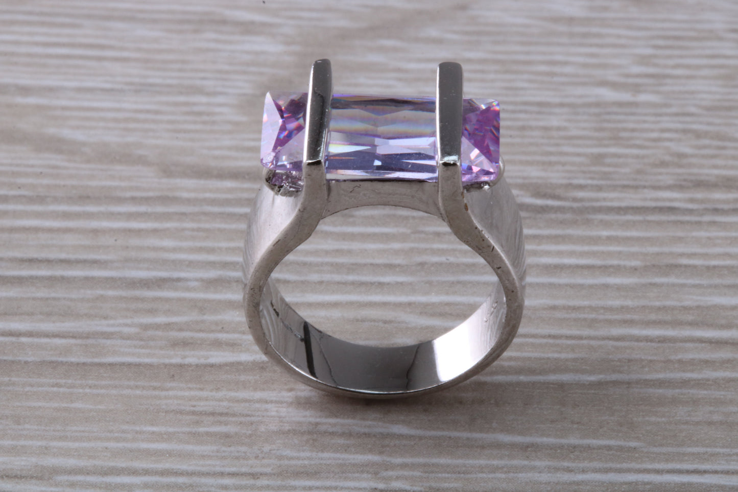 Elegant real Amethyst look ring, sterling silver set with rectangle cut Amethyst C Z, very unusual design