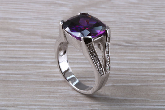 Elegant real Amethyst look ring, sterling silver set with cushion cut Amethyst C Z, very unusual design