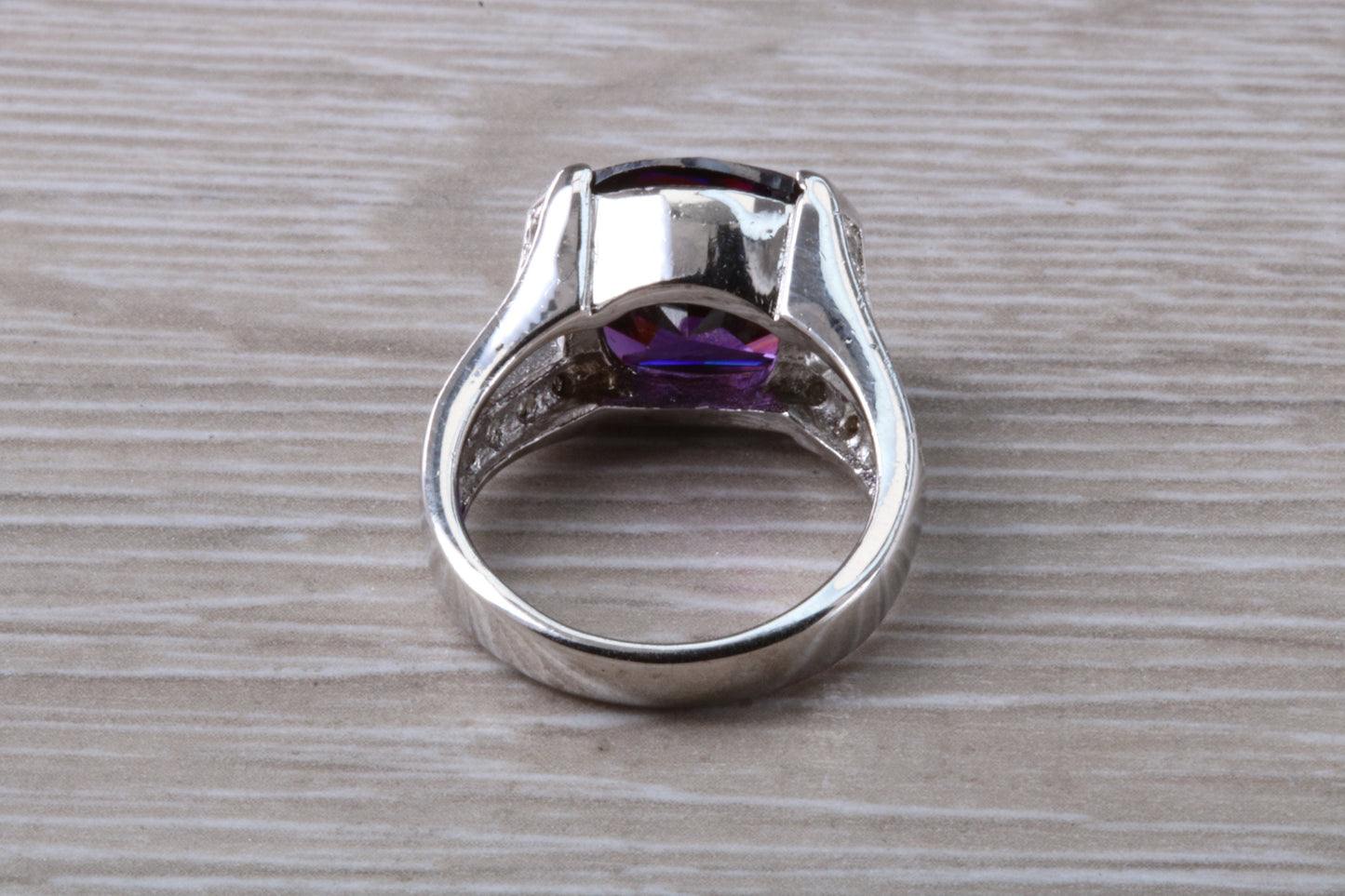 Elegant real Amethyst look ring, sterling silver set with cushion cut Amethyst C Z, very unusual design