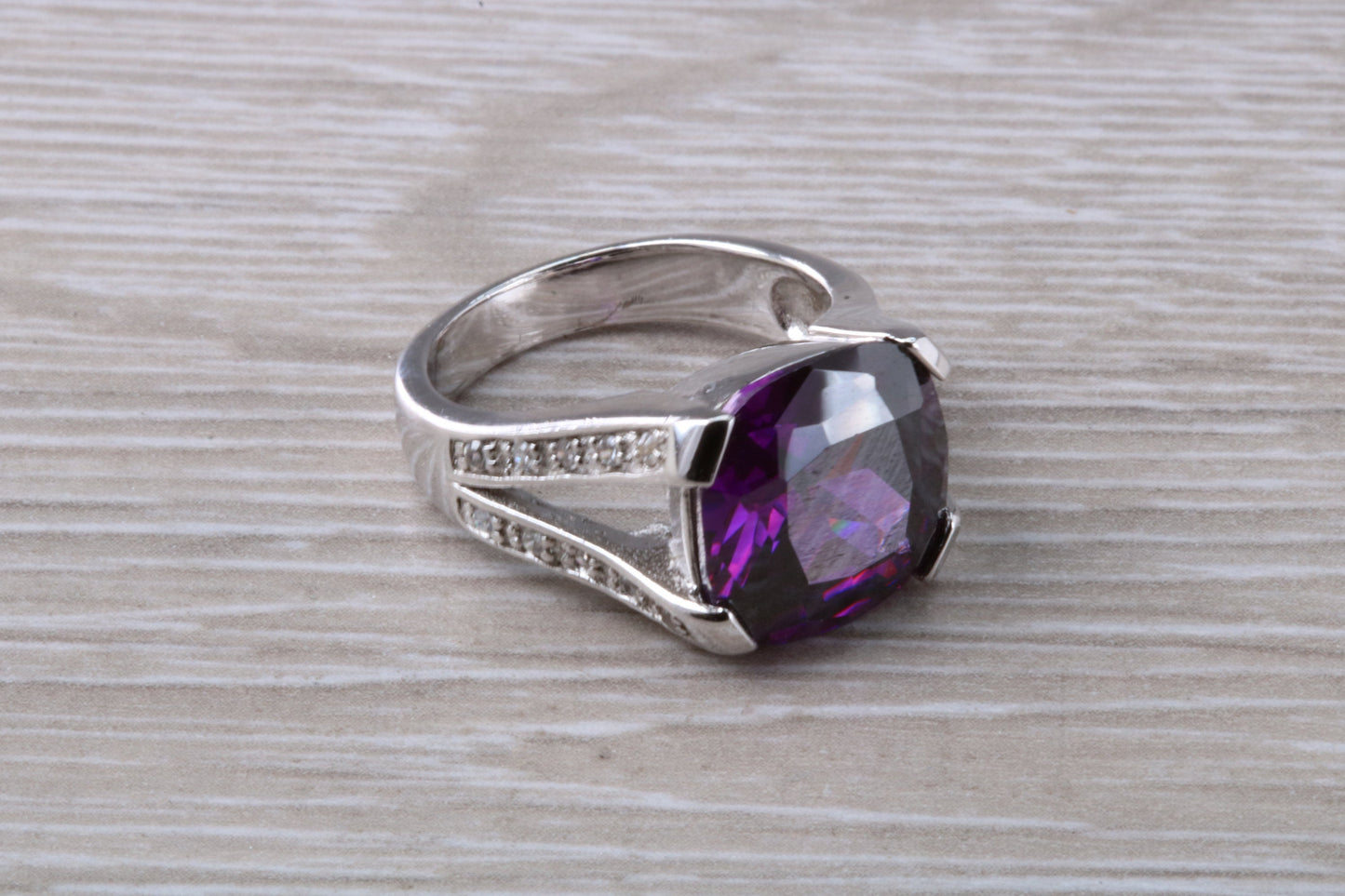 Elegant real Amethyst look ring, sterling silver set with cushion cut Amethyst C Z, very unusual design