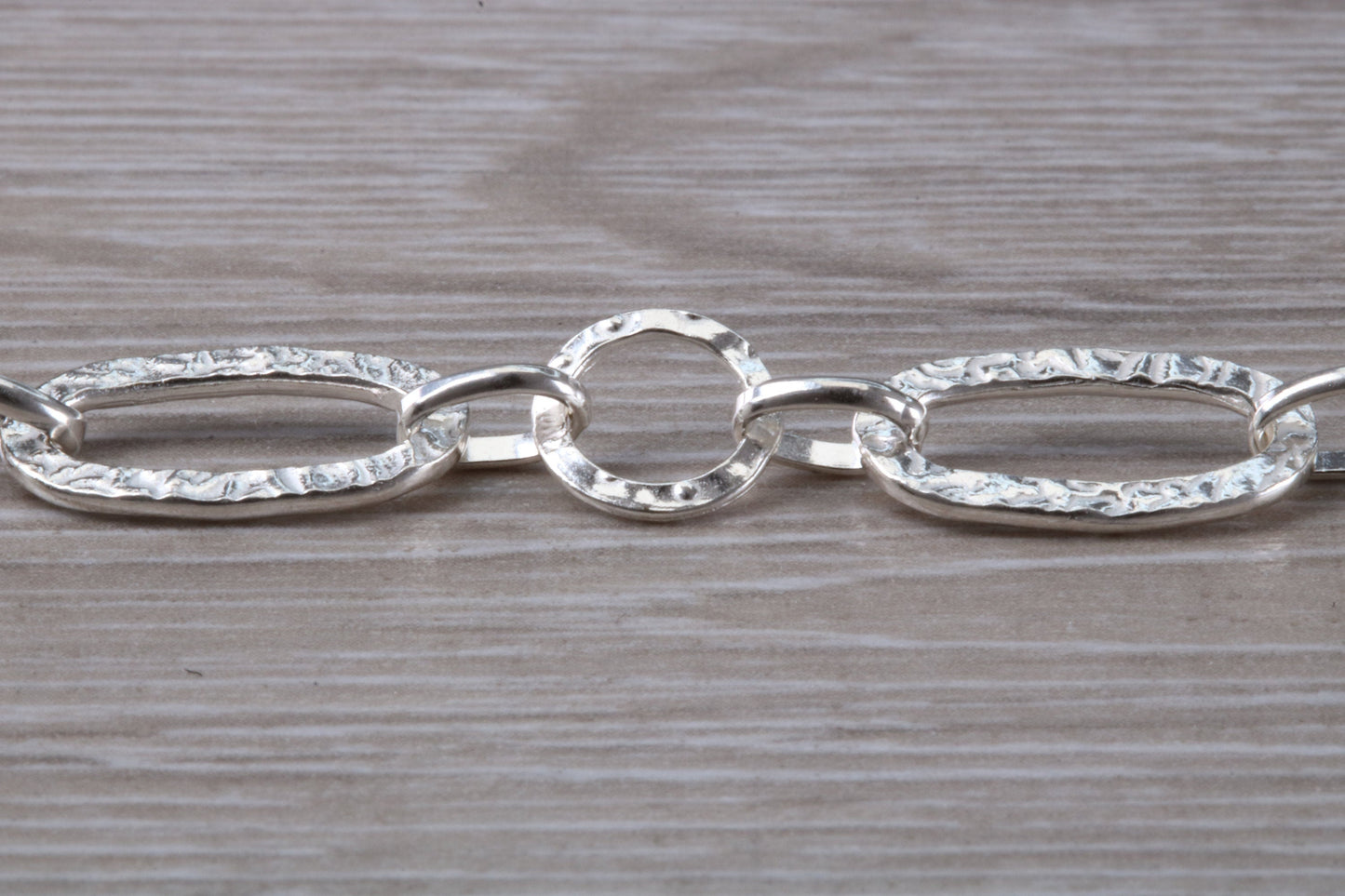 Silver open linked Bracelet with oval and round shaped hammered effect links, light weight and suitable for age groups
