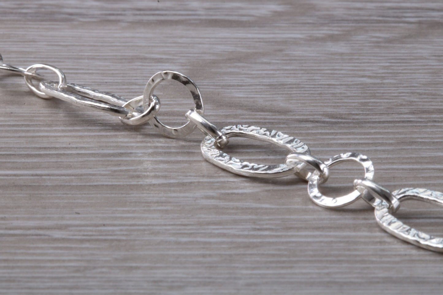 Silver open linked Bracelet with oval and round shaped hammered effect links, light weight and suitable for age groups