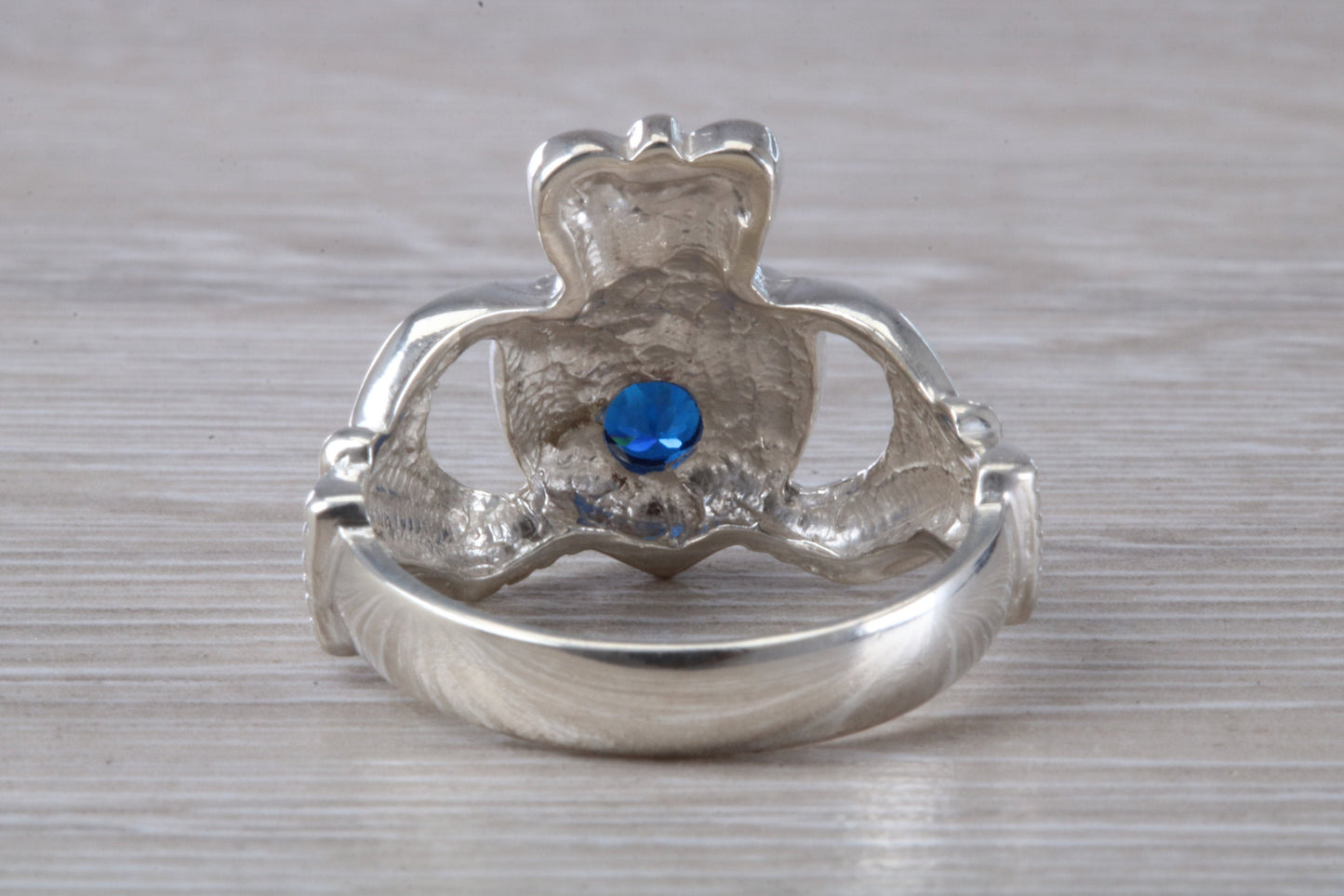Very large and very heavy stone set Claddagh ring, set with Sapphire Blue C Z, solid silver, suitable for ladies or gents