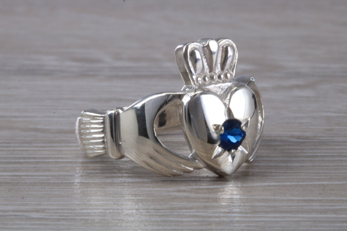 Very large and very heavy stone set Claddagh ring, set with Sapphire Blue C Z, solid silver, suitable for ladies or gents