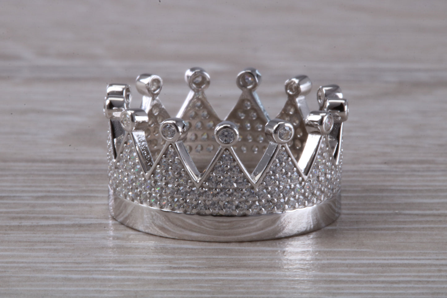 Crown ring, C Z set in solid sterling silver and further rhodium plated for that platinum look