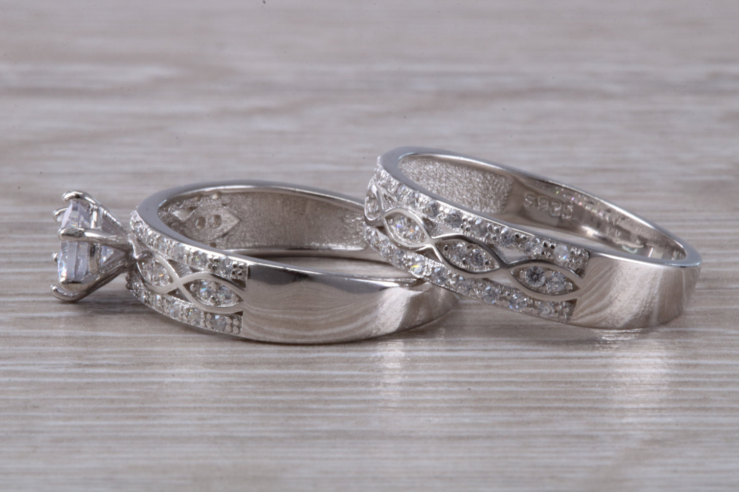 Diamond look Bridal rings set, C Z set in sterling silver and further rhodium plated for that platinum look, engagement and wedding ring set