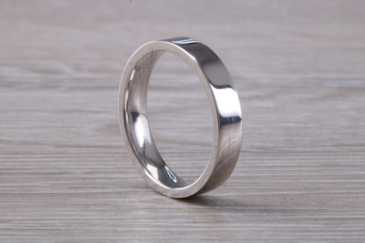 4 mm Wide Flat Comfort Fit Profile Wedding Band, made from solid 9ct White Gold