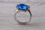 Elegant real Blue Sapphire look ring, sterling silver set with Oval cut Sapphire C Z, very unusual design