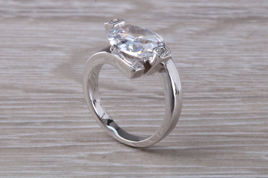 Elegant real Diamond look ring, sterling silver set with Oval cut Diamond white C Z, very unusual design