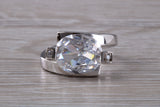 Elegant real Diamond look ring, sterling silver set with Oval cut Diamond white C Z, very unusual design