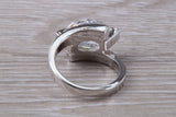 Elegant real Diamond look ring, sterling silver set with Oval cut Diamond white C Z, very unusual design