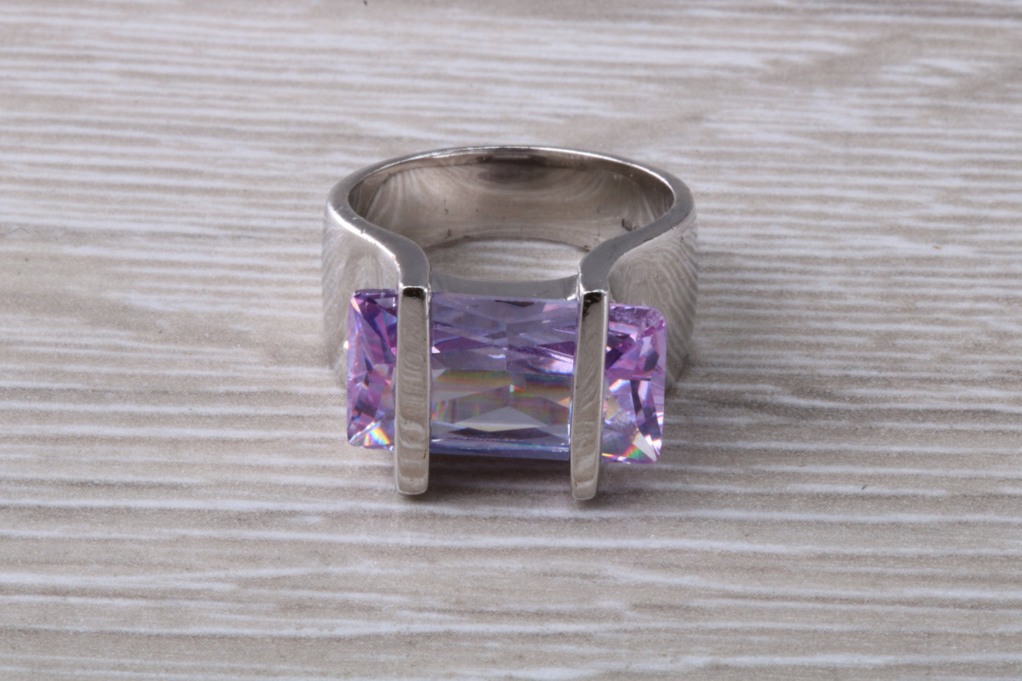 Elegant real Amethyst look ring, sterling silver set with rectangle cut Amethyst C Z, very unusual design