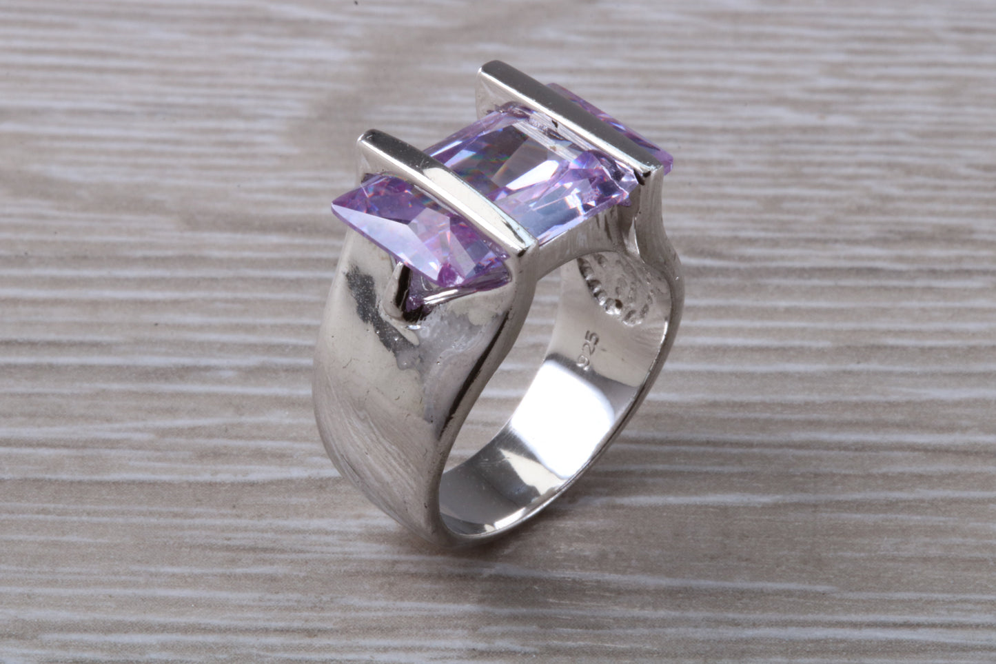 Elegant real Amethyst look ring, sterling silver set with rectangle cut Amethyst C Z, very unusual design