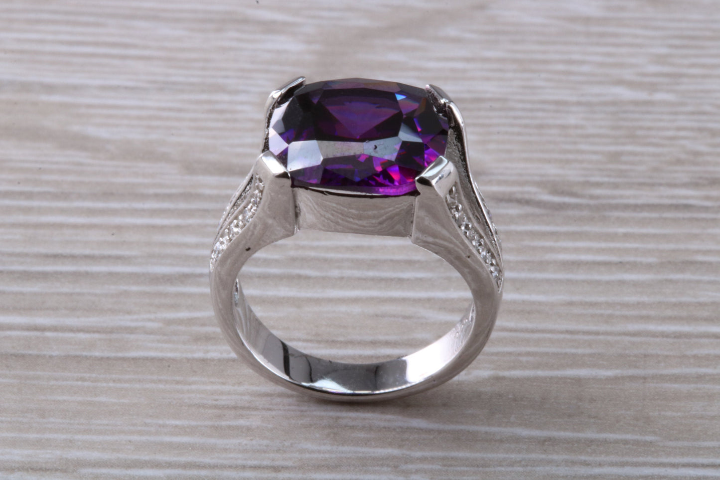 Elegant real Amethyst look ring, sterling silver set with cushion cut Amethyst C Z, very unusual design