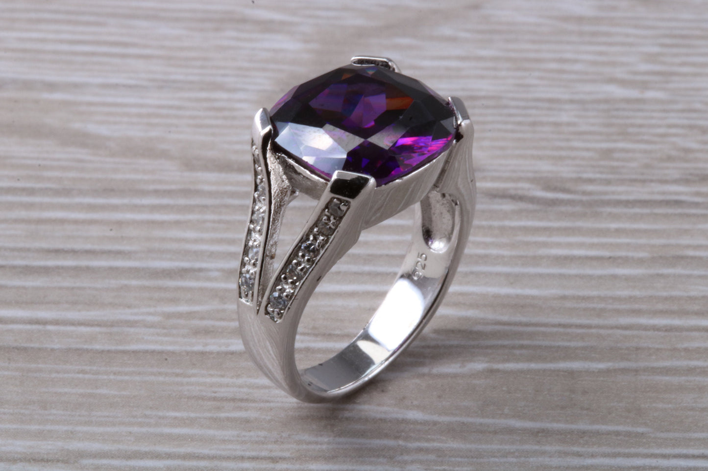 Elegant real Amethyst look ring, sterling silver set with cushion cut Amethyst C Z, very unusual design