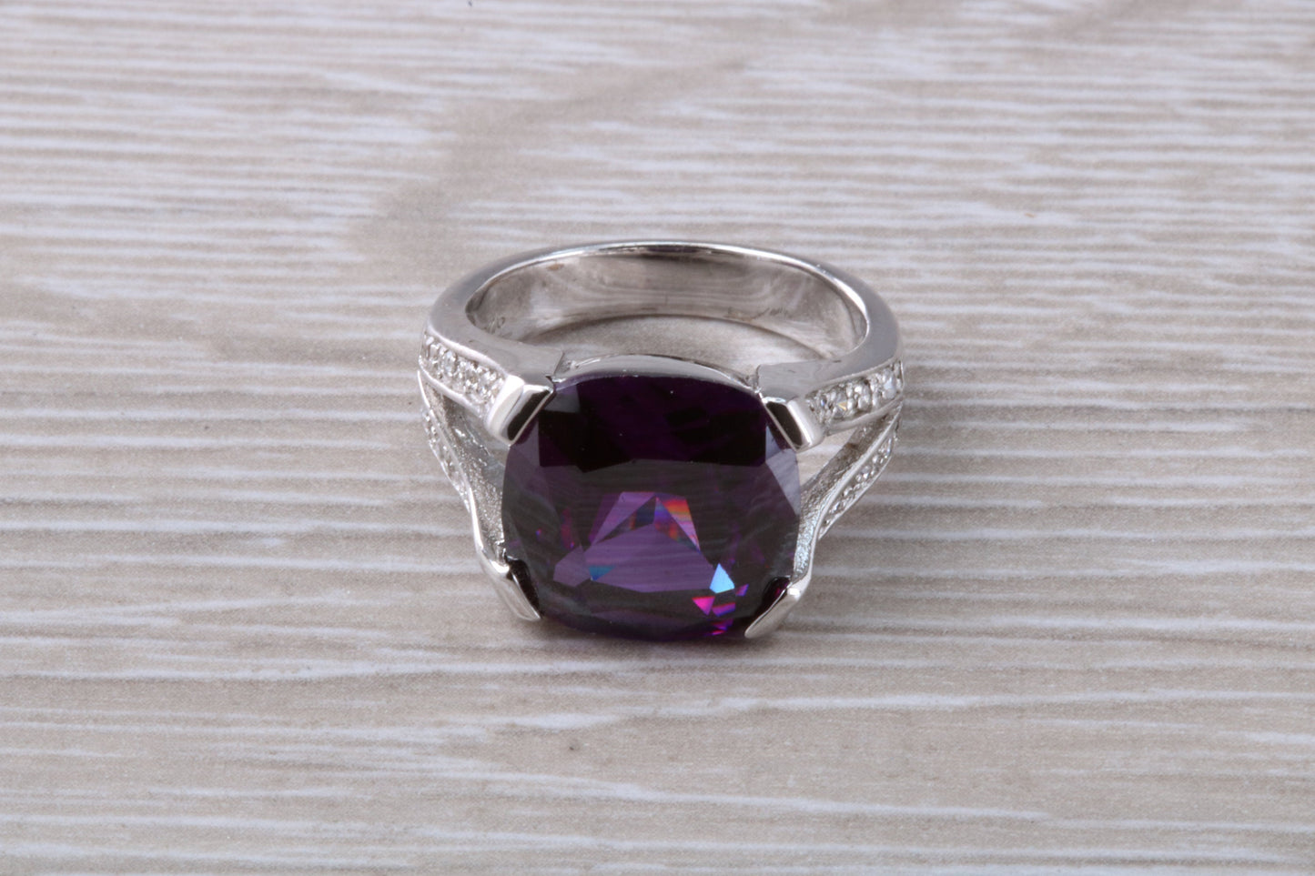 Elegant real Amethyst look ring, sterling silver set with cushion cut Amethyst C Z, very unusual design