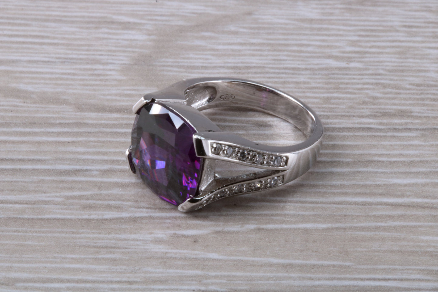 Elegant real Amethyst look ring, sterling silver set with cushion cut Amethyst C Z, very unusual design