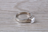 Simple and very elegant real Diamond look ring, sterling silver set with Princess cut diamond look C Z, Ideal promise, dress engagement ring