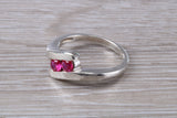 Ruby ring, crossover styled, sterling silver set with two round cut Ruby Cubic Zirconia, Ideal promise, dress engagement ring