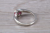 Ruby ring, crossover styled, sterling silver set with two round cut Ruby Cubic Zirconia, Ideal promise, dress engagement ring