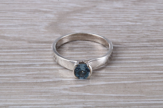 Simple and very elegant real Aquamarine look ring, sterling silver set with half carat Aquamarine C Z, very smooth rub over setting