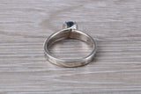 Simple and very elegant real Aquamarine look ring, sterling silver set with half carat Aquamarine C Z, very smooth rub over setting
