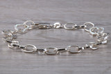 Silver open linked Bracelet with oval and heart shaped links, light weight and suitable for age groups