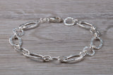 Silver open linked Bracelet with oval and round shaped hammered effect links, light weight and suitable for age groups
