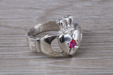 Very large and very heavy stone set Claddagh ring, set with Ruby Red C Z, solid silver, suitable for ladies or gents