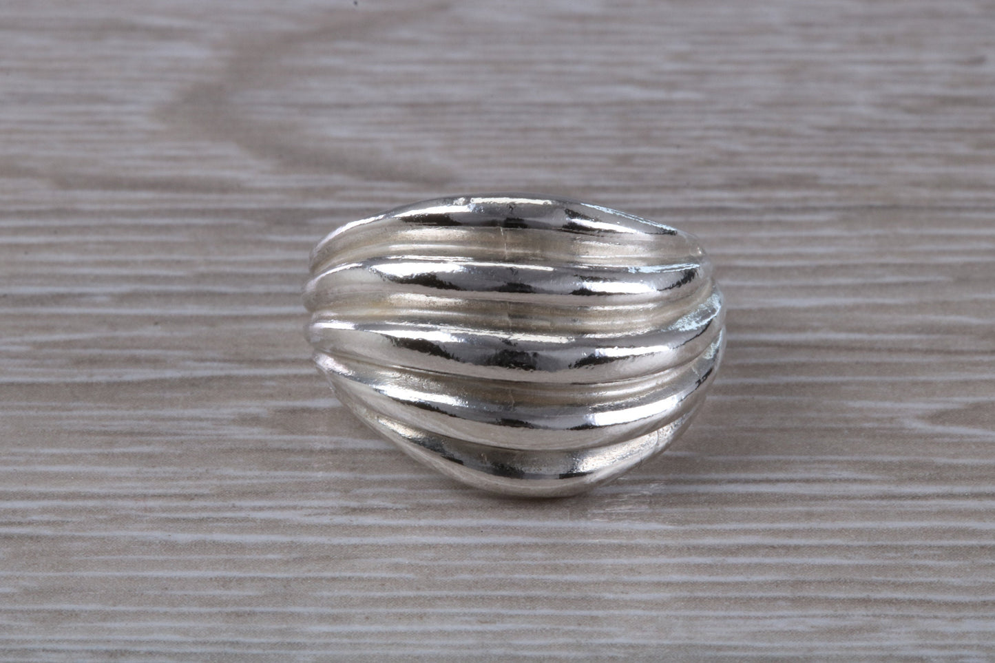 Abstract ring, solid silver with high polished finish, suitable for all ages. Available in silver, yellow gold, white gold and platinum