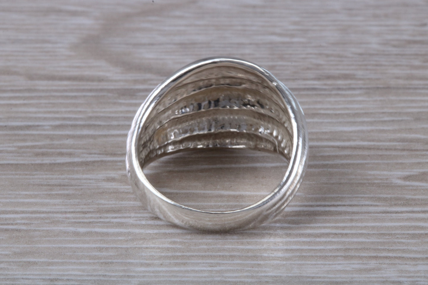 Abstract ring, solid silver with high polished finish, suitable for all ages. Available in silver, yellow gold, white gold and platinum