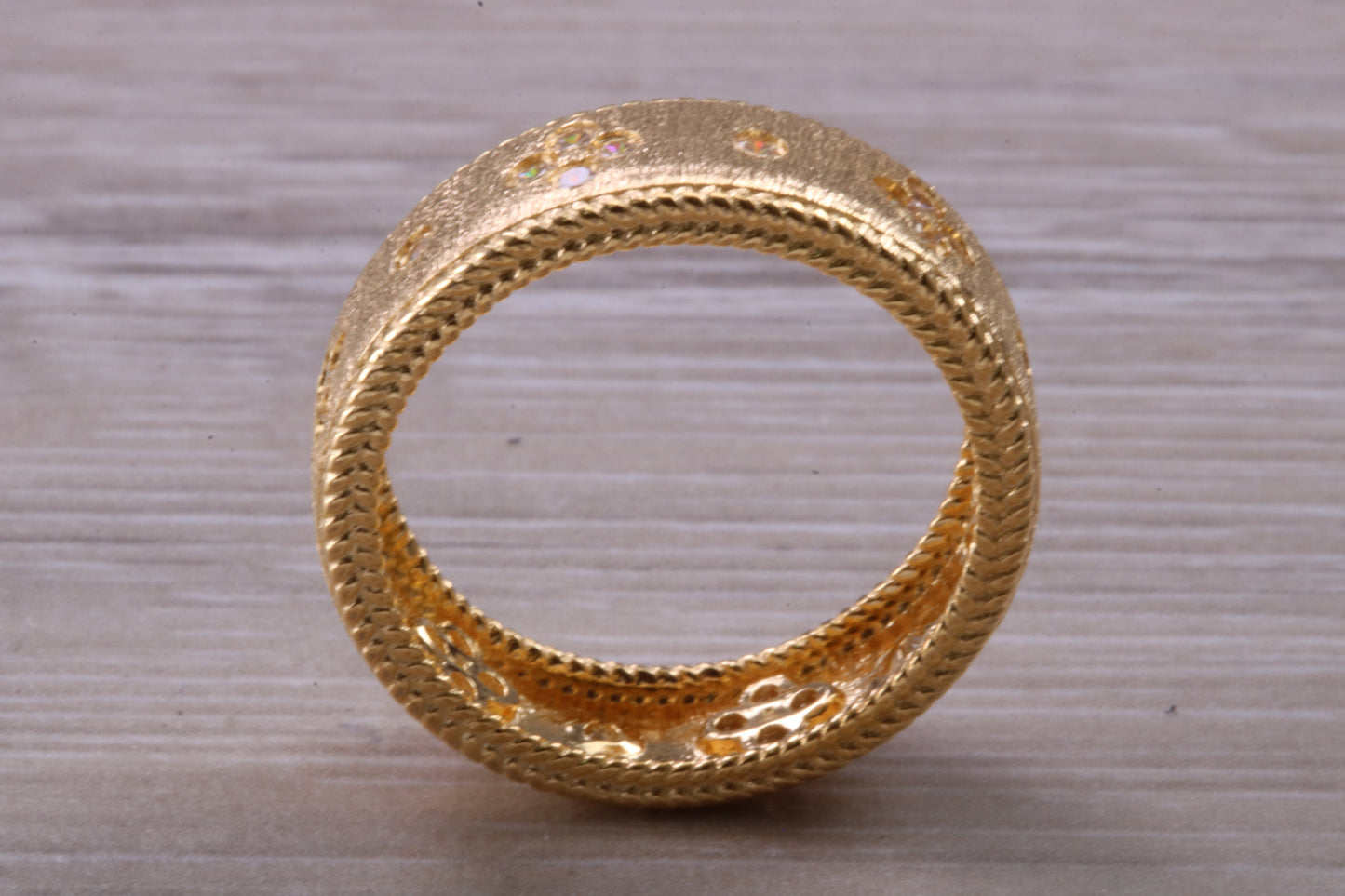 Sterling Silver 7 mm wide band, 18ct Yellow Gold plated and set with Diamond White C Z