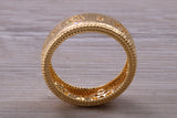 Sterling Silver 7 mm wide band, 18ct Yellow Gold plated and set with Diamond White C Z