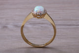 Opal and Diamond White Cubic Zirconia set ring, solid 9ct Yellow Gold, very fiery oval cut Cultured Opal