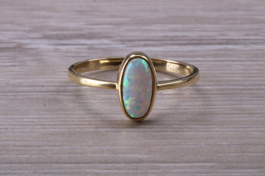 9ct Yellow Gold Opal set ring, solid 9ct Gold, British Hallmarked, very fiery oval cut Cultured Opal