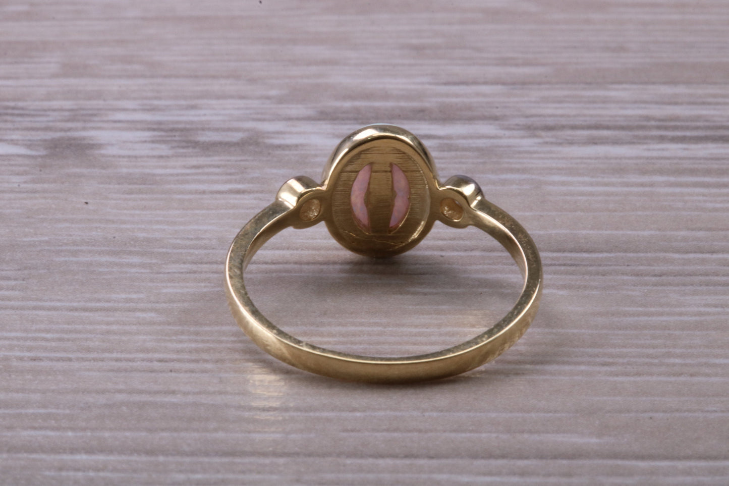 Opal and Diamond White Cubic Zirconia set Trilogy ring, solid 9ct Yellow Gold, very fiery oval cut Cultured Opal