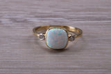 Opal and Diamond White Cubic Zirconia set Trilogy ring, solid 9ct Yellow Gold, very fiery oval cut Cultured Opal