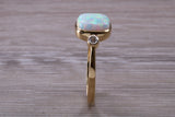 Opal and Diamond White Cubic Zirconia set Trilogy ring, solid 9ct Yellow Gold, very fiery oval cut Cultured Opal